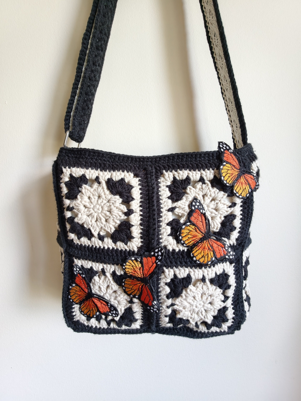 Handmade Black and Cream Crochet Crossbody Bag with Orange Butterfly Accents